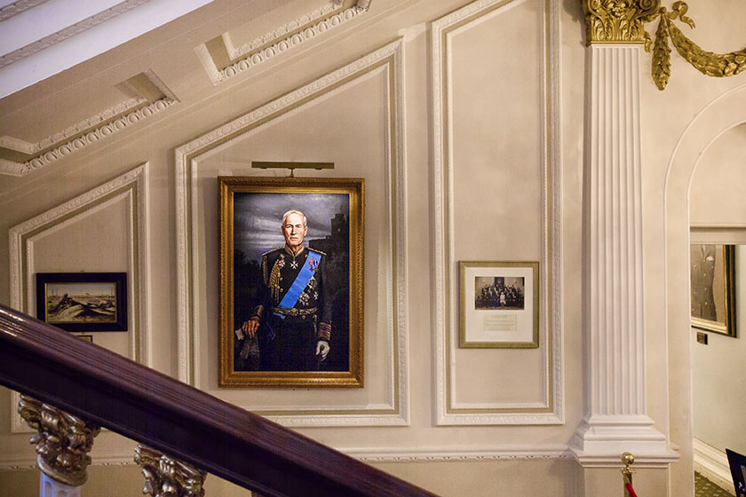 large portraits in the in and out club, london with hogarth classic picture lights