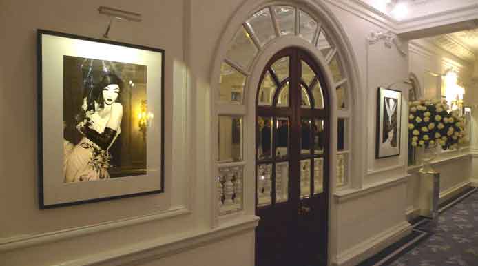 Galliano hallway at Claridges photographs lit by Hogarth rechargeable battery picture lights