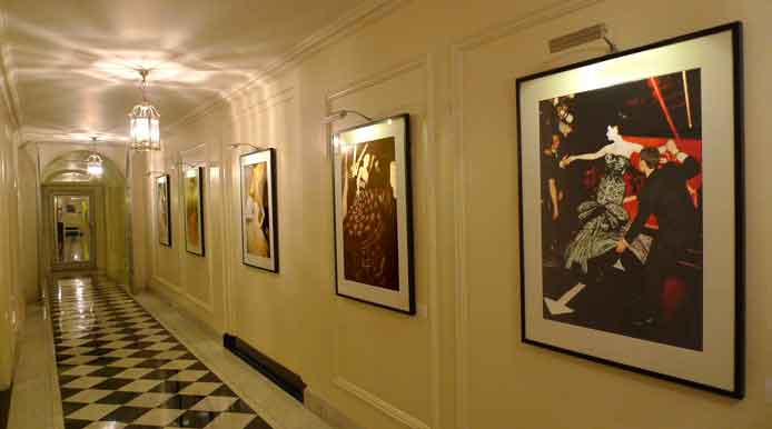 Galliano hallway at Claridges photographs lit by Hogarth rechargeable battery picture lights