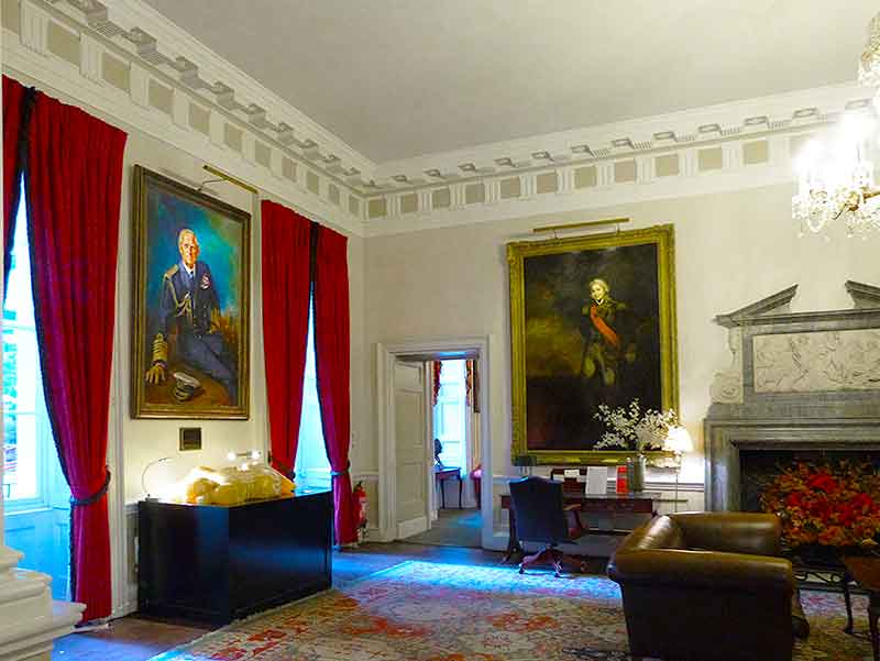 contemporary picture light hanging above painting in the ironmongers hall barbican