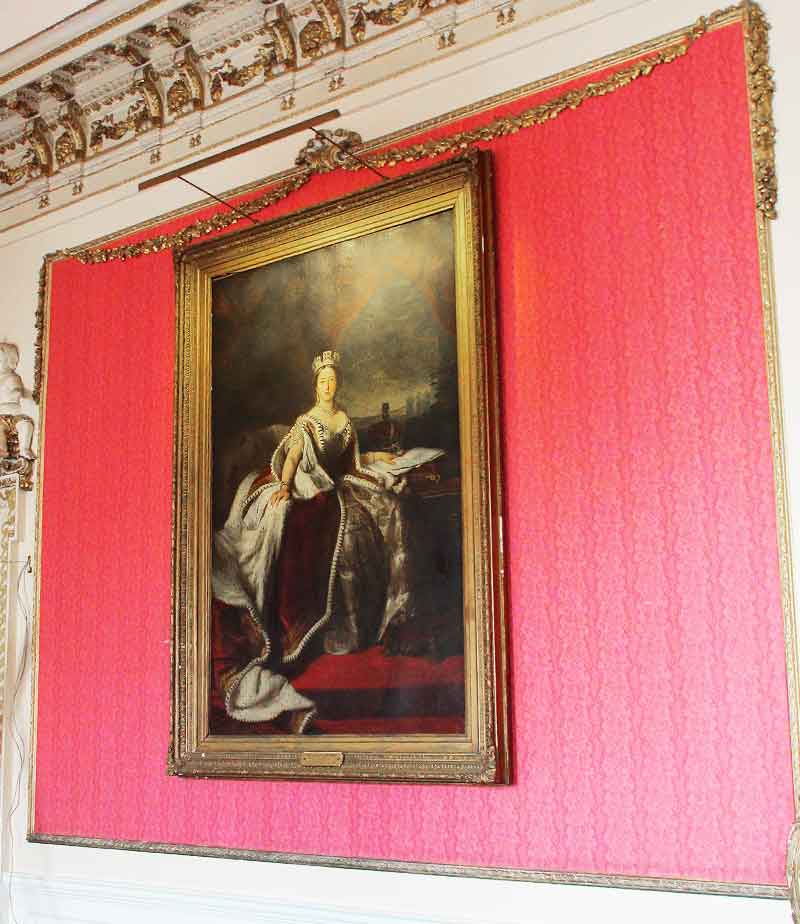 contemporary picture light hanging above painting in the ironmongers hall barbican