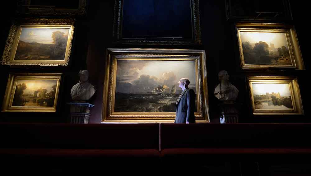 petworth picture light illuminating the turner exhibition at petworth house